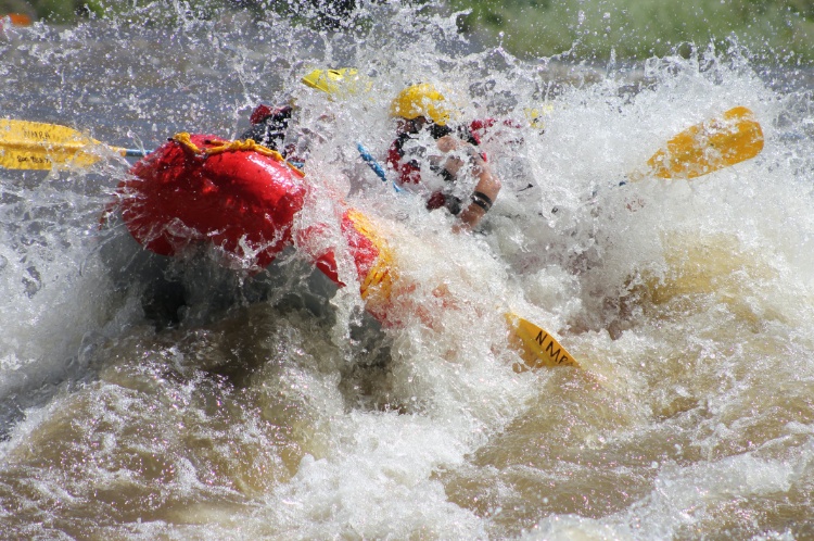 Wedding Rafting trip going through rapids in new mexico