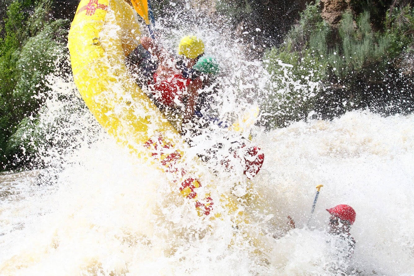 Going through huge taos box rapids