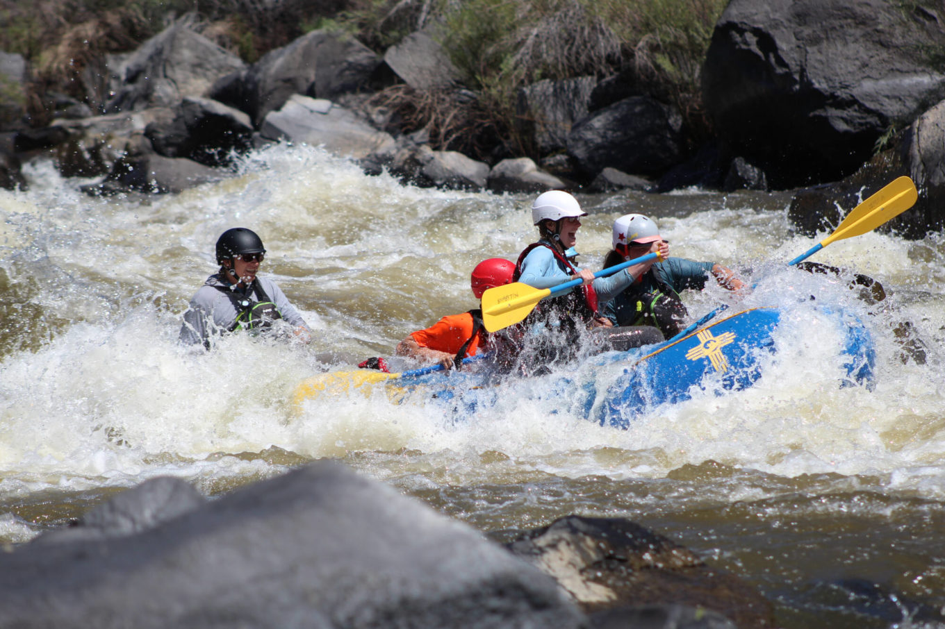 Going through whitewater during the razorblades rafting trip