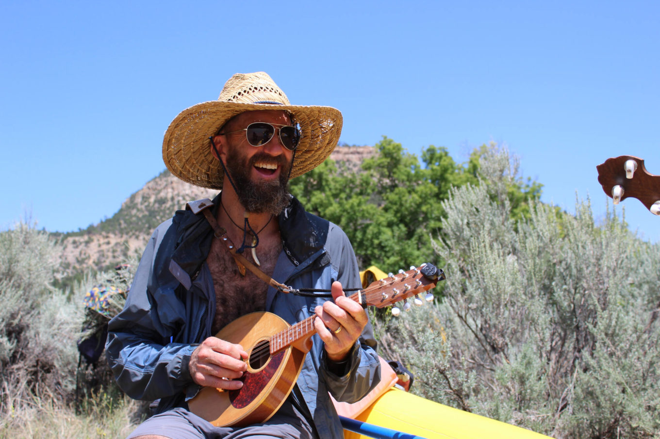Playing music during river trip on the Rio Chama