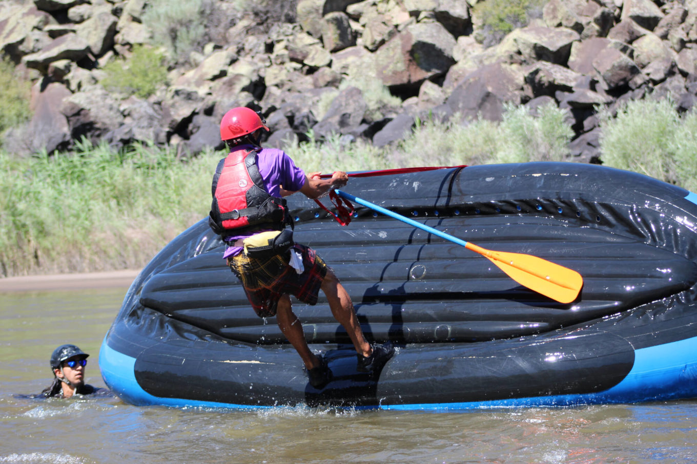 Pulling raft over during swiftwater rescue courses