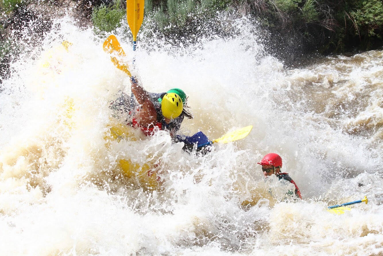 Rafting through rapids in Taos Box