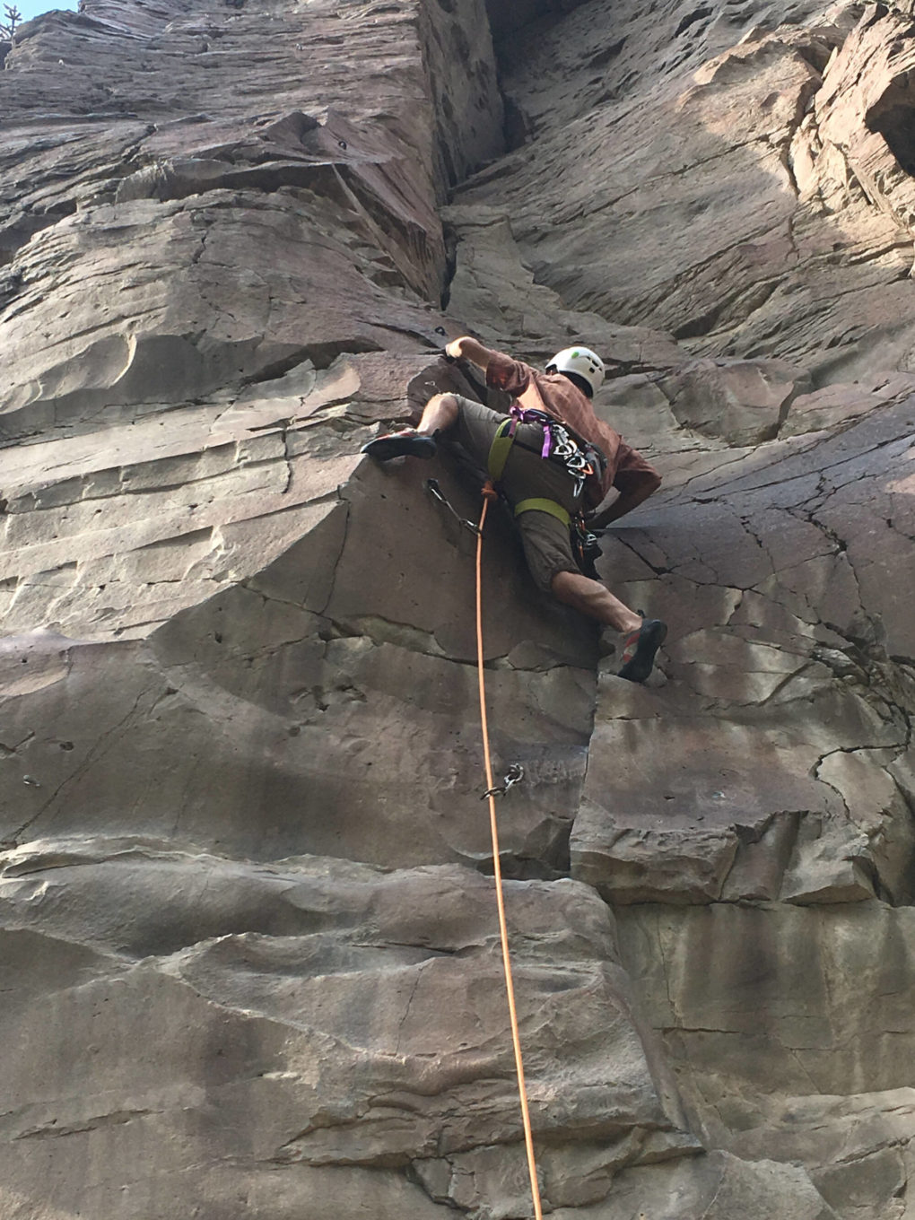 Rock climbing during new mexico rafting trip