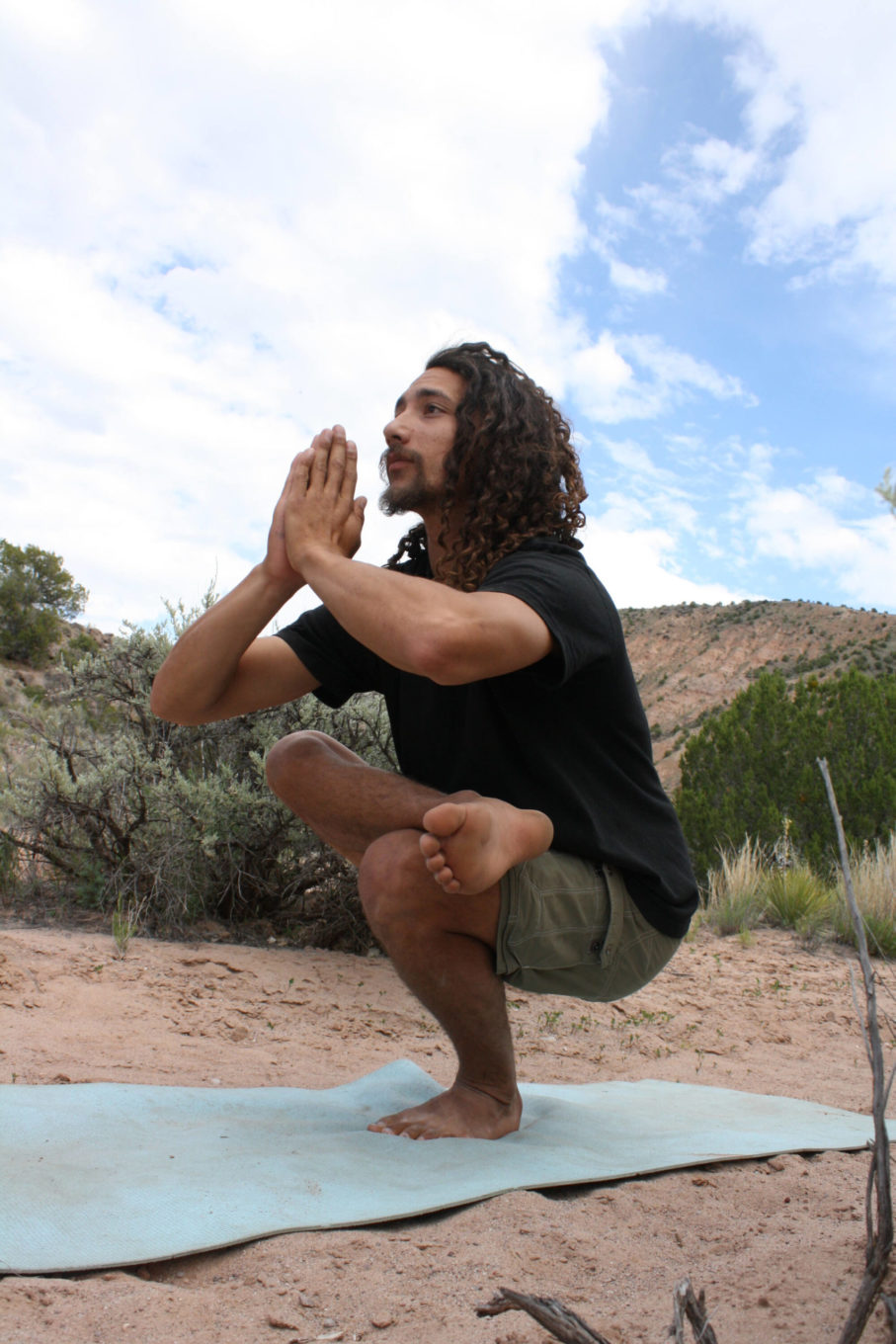 Yoga by the river during yoga retreat