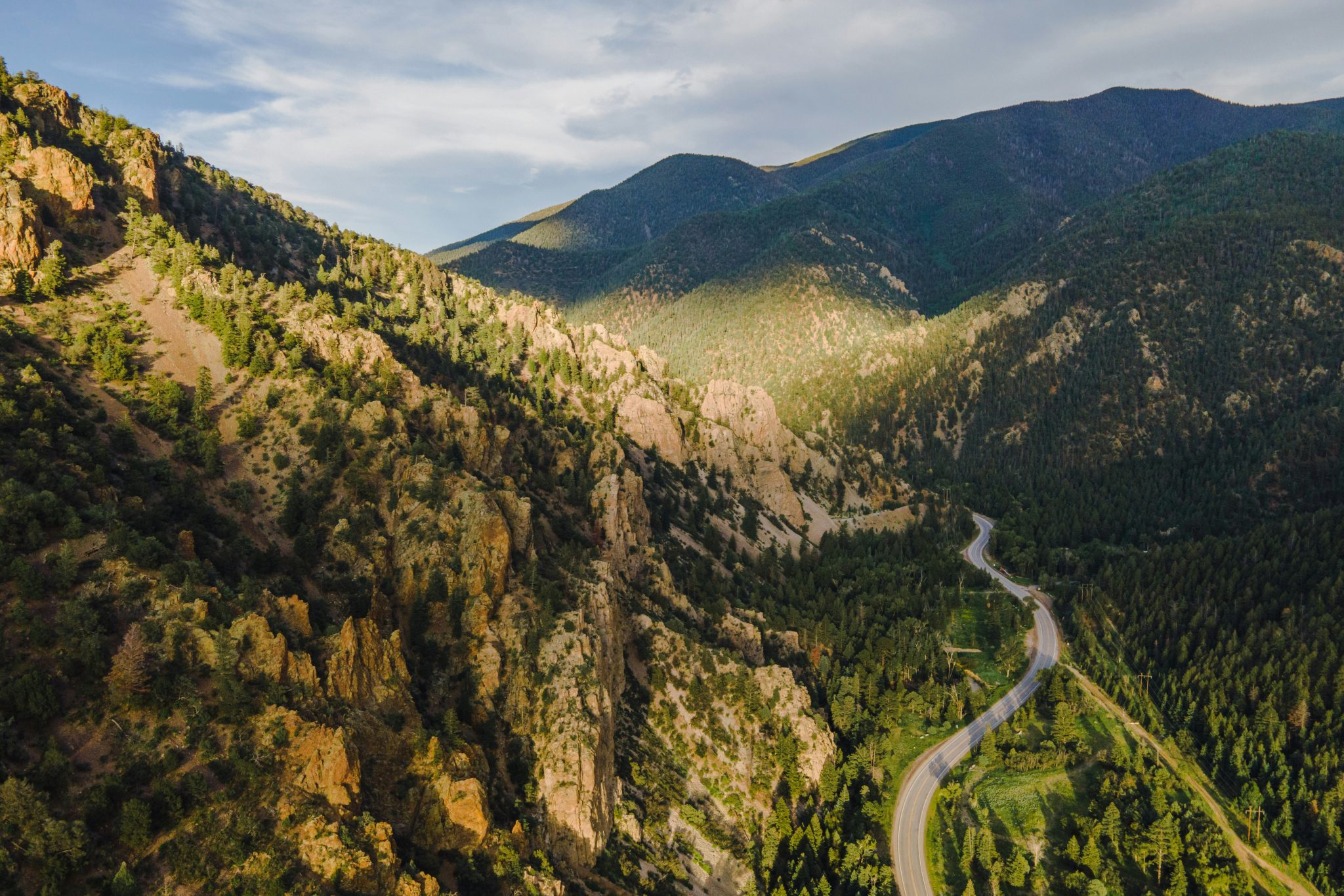 matthew-lancaster-qTNpaPbOxHg-unsplash-2048x1365 A road winds through red river, new mexico